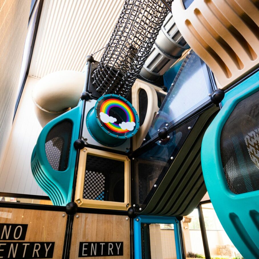 RhinoPlay Playground with Rainbow look out window